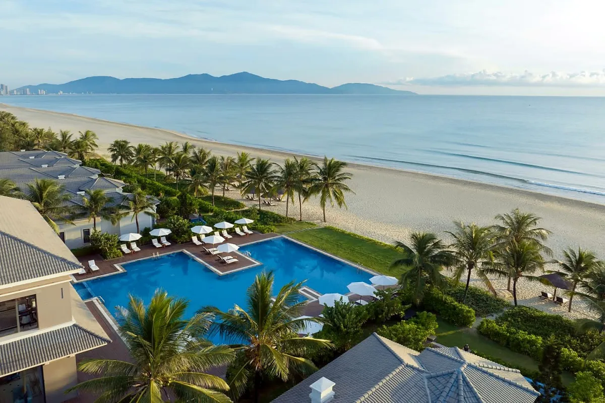 A beachfront resort with a pool on the Non Nuoc coast, seen from the air