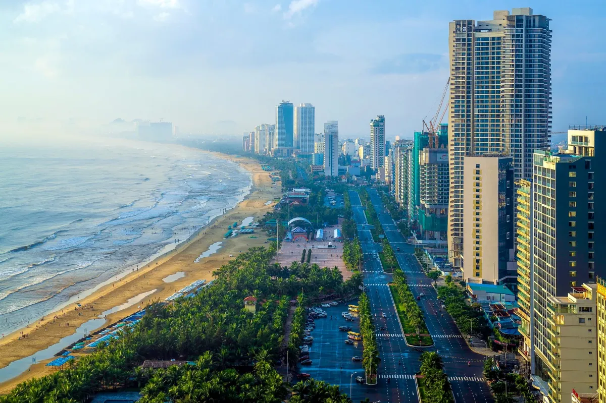 Aerial view of My Khe beach, the coast road and beachfront hotels in Da Nang
